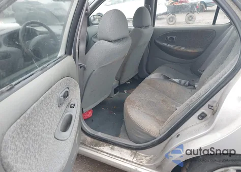 1999 Hyundai Elantra Gl z USA, uszkodzony, nr VIN KMHJF25F9XU863891